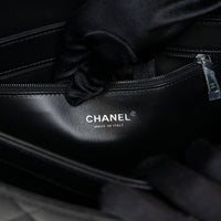 Pre-Loved Chanel™ Black Grained Quilted Leather Large Trendy Bag