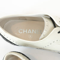 Pre-Loved Chanel™ White and Black Patent Leather Loafers Size 38.5