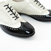Pre-Loved Chanel™ White and Black Patent Leather Loafers Size 38.5
