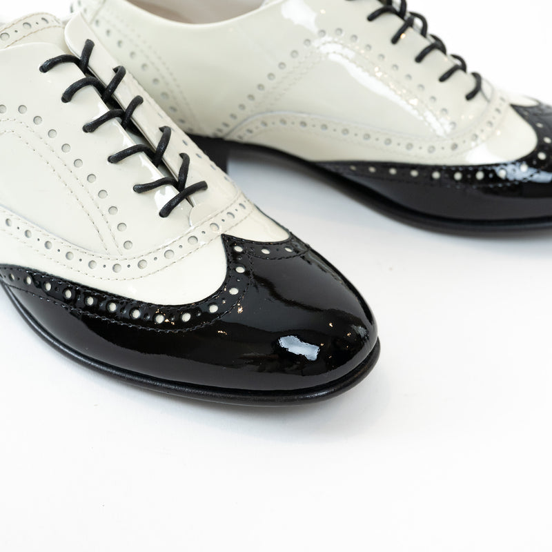Pre-Loved Chanel™ White and Black Patent Leather Loafers Size 38.5