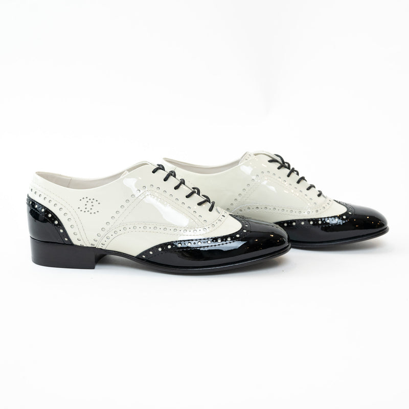 Pre-Loved Chanel™ White and Black Patent Leather Loafers Size 38.5