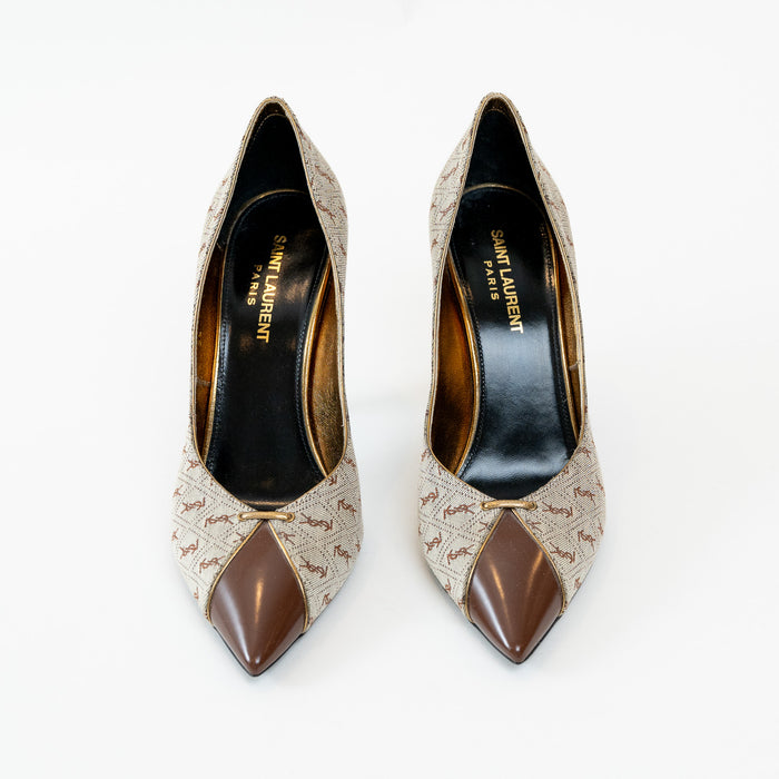 Pair of high-heeled shoes with brown and beige design on a white background