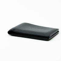 Louis Vuitton Black Smooth Leather Monogram Embossed Bifold Wallet
