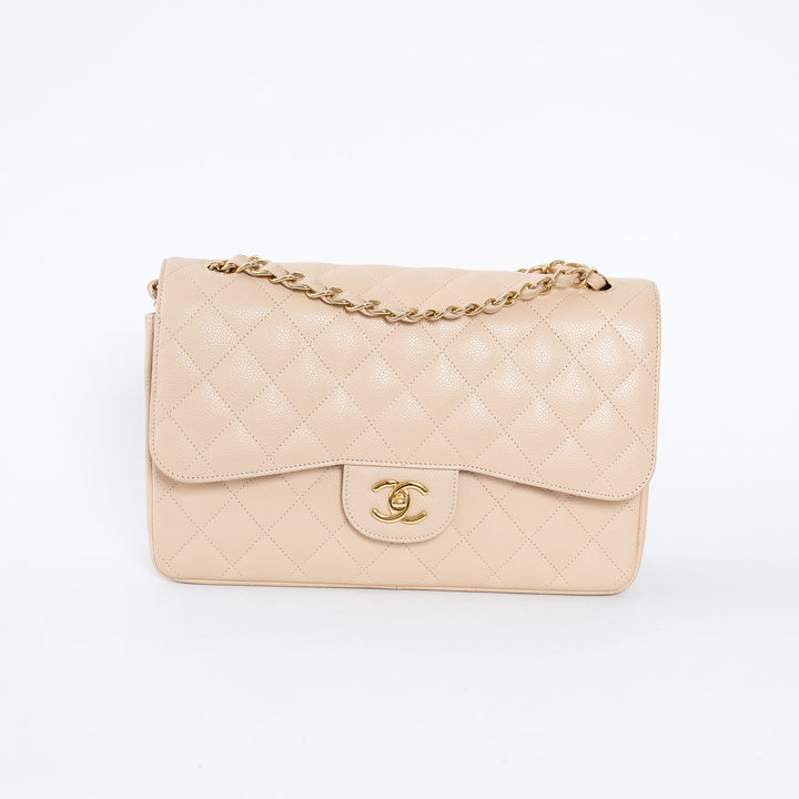Pre-Loved Chanel™ Beige Caviar Leather Jumbo Double Flap Bag
