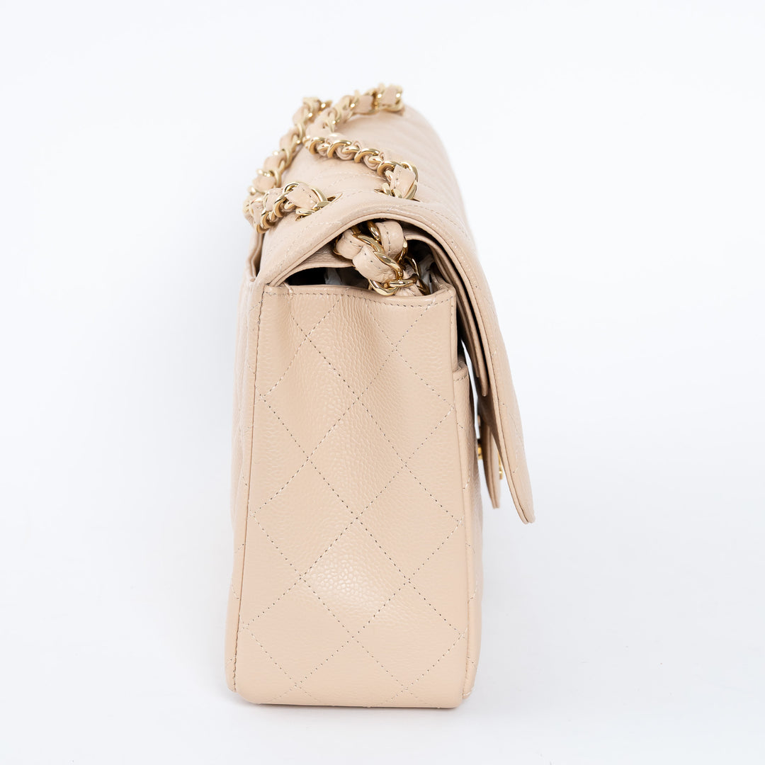 Pre-Loved Chanel™ Beige Caviar Leather Jumbo Double Flap Bag