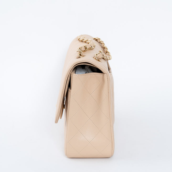 Pre-Loved Chanel™ Beige Caviar Leather Jumbo Double Flap Bag