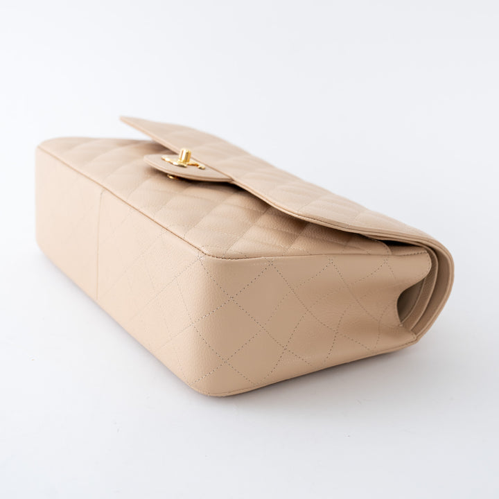 Pre-Loved Chanel™ Beige Caviar Leather Jumbo Double Flap Bag