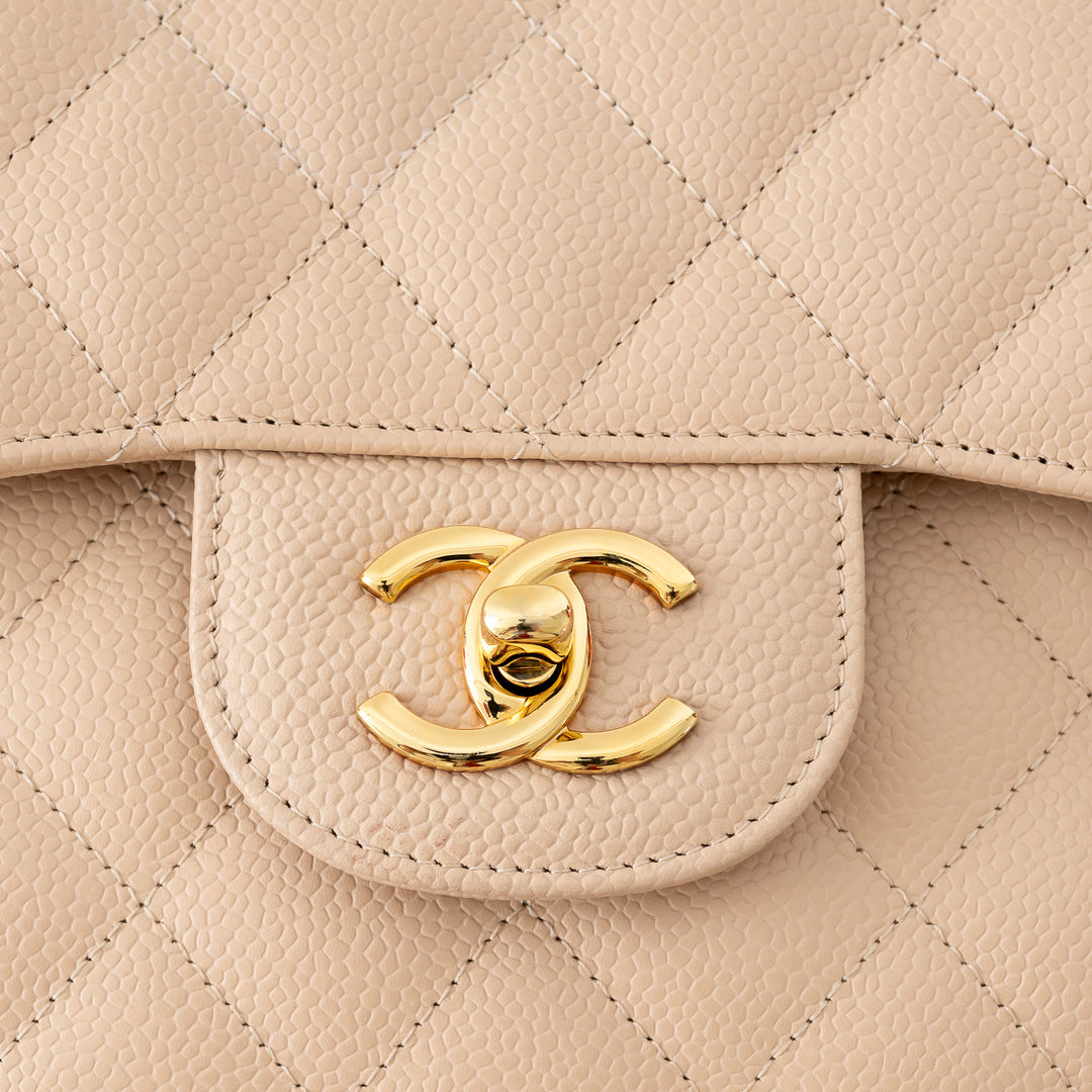 Pre-Loved Chanel™ Beige Caviar Leather Jumbo Double Flap Bag