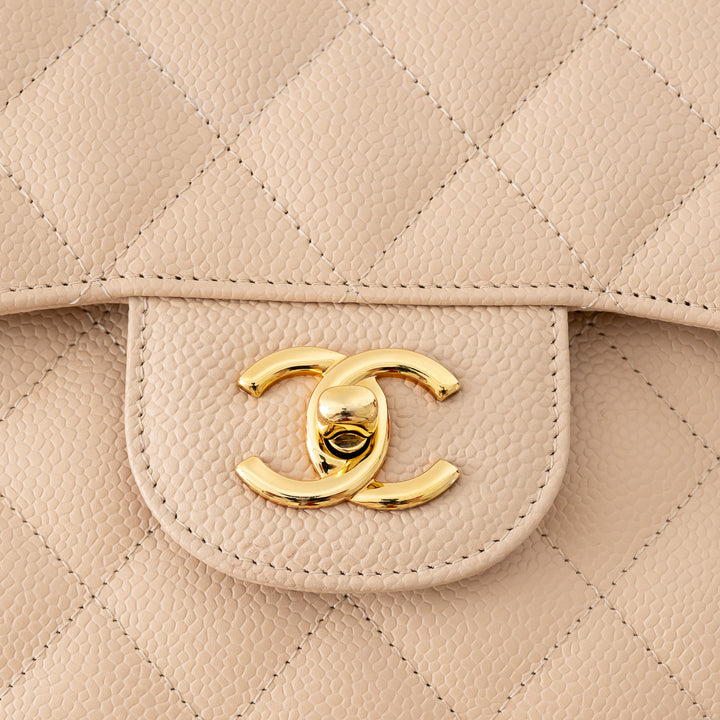 Pre-Loved Chanel™ Beige Caviar Leather Jumbo Double Flap Bag