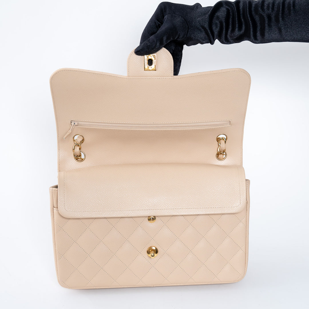 Pre-Loved Chanel™ Beige Caviar Leather Jumbo Double Flap Bag
