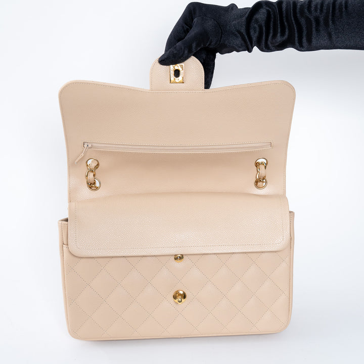 Pre-Loved Chanel™ Beige Caviar Leather Jumbo Double Flap Bag