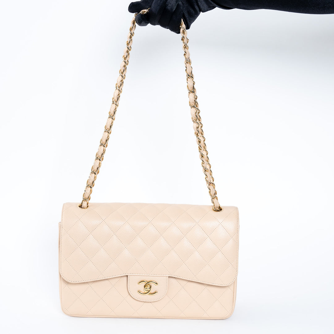 Pre-Loved Chanel™ Beige Caviar Leather Jumbo Double Flap Bag
