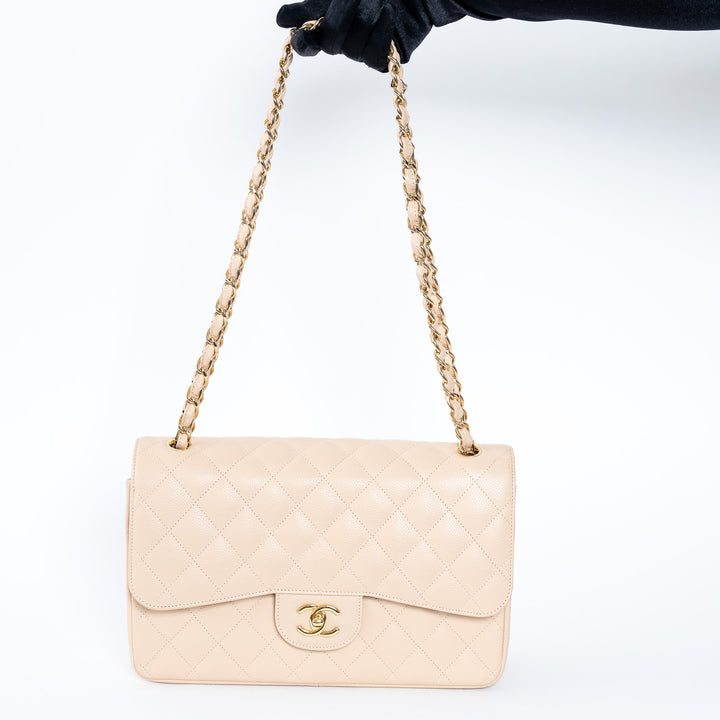Pre-Loved Chanel™ Beige Caviar Leather Jumbo Double Flap Bag
