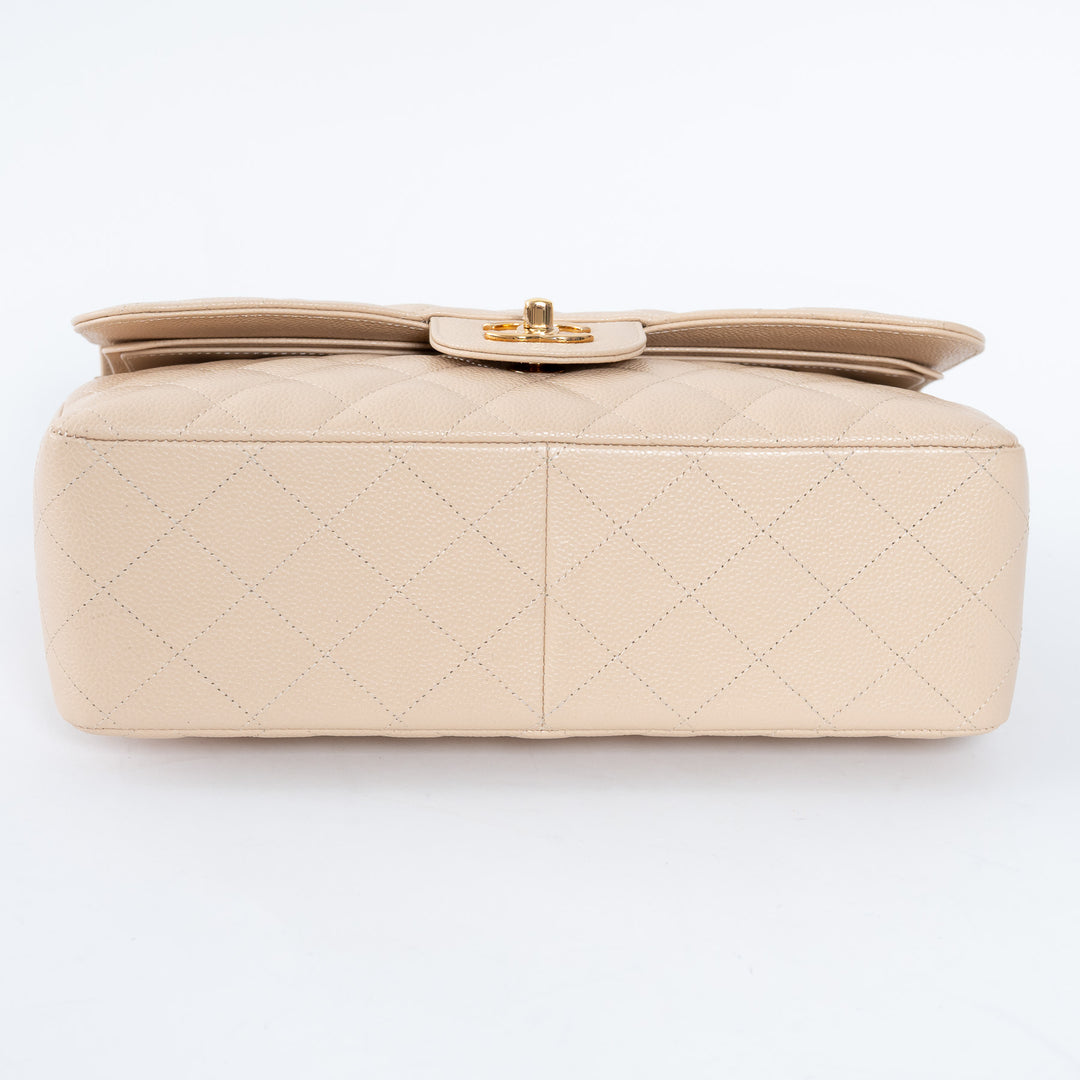 Pre-Loved Chanel™ Beige Caviar Leather Jumbo Double Flap Bag