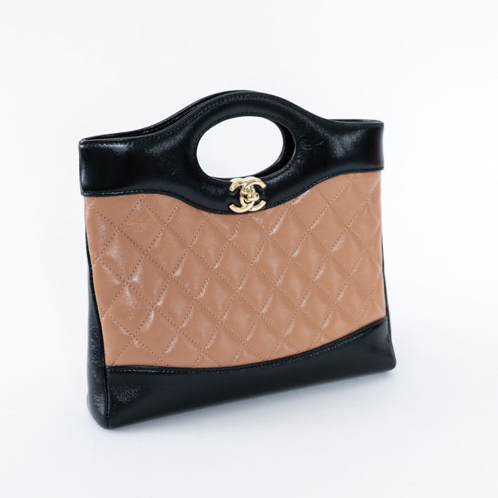 Pre-Loved Chanel™ Tan & Black Shiny Calfskin Leather Mini 31 Handbag
