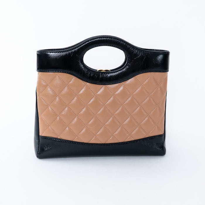 Pre-Loved Chanel™ Tan & Black Shiny Calfskin Leather Mini 31 Handbag