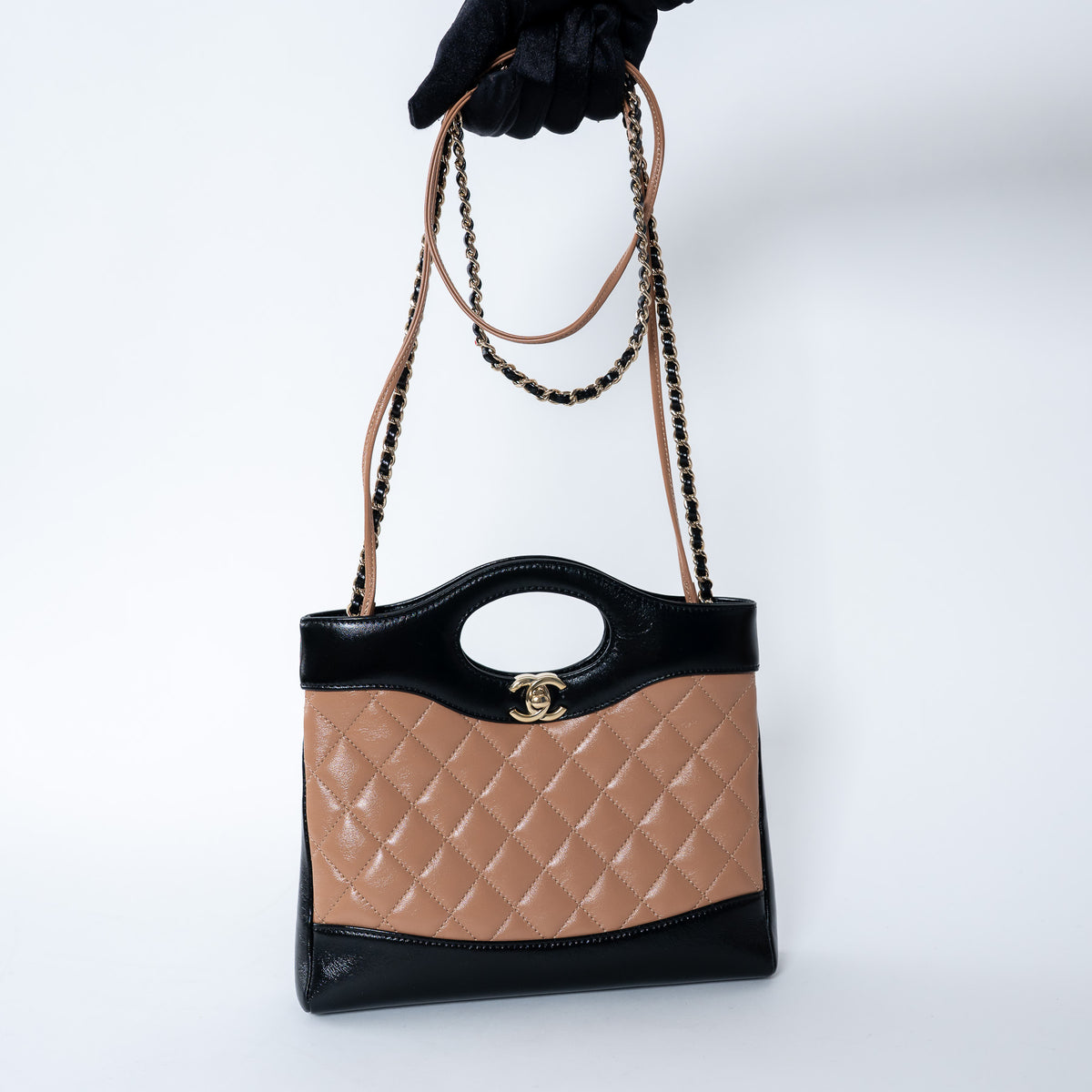 Pre-Loved Chanel™ Tan & Black Shiny Calfskin Leather Mini 31 Handbag