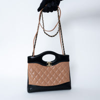 Pre-Loved Chanel™ Tan & Black Shiny Calfskin Leather Mini 31 Handbag