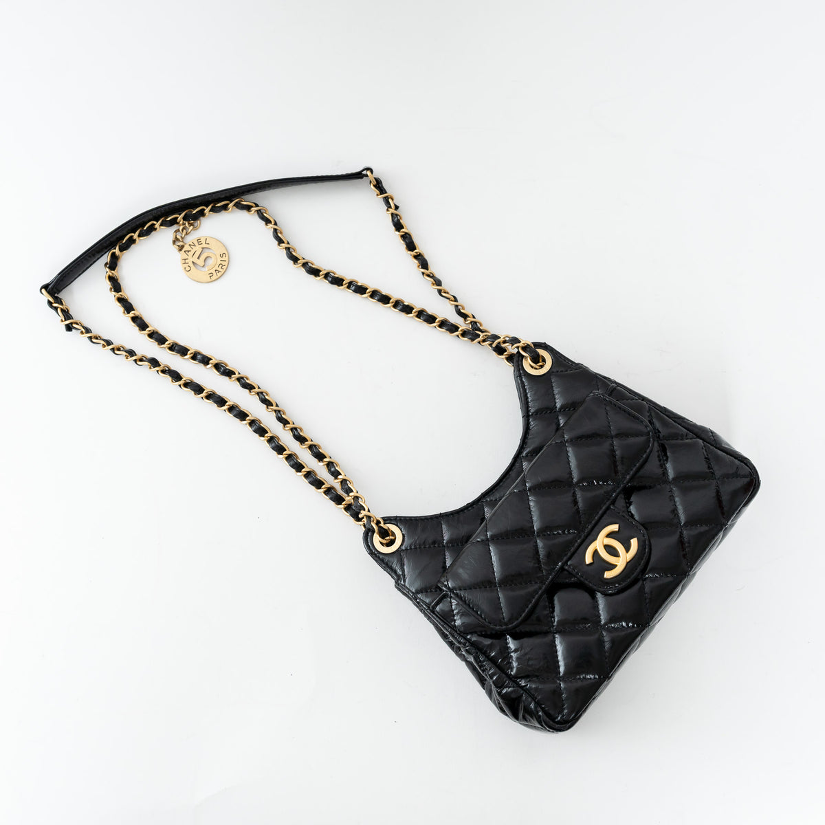 Pre-Loved Chanel™ Black Shiny Aged Calfskin Leather Small Wave Hobo Bag