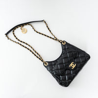 Pre-Loved Chanel™ Black Shiny Aged Calfskin Leather Small Wave Hobo Bag