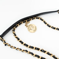 Pre-Loved Chanel™ Black Shiny Aged Calfskin Leather Small Wave Hobo Bag