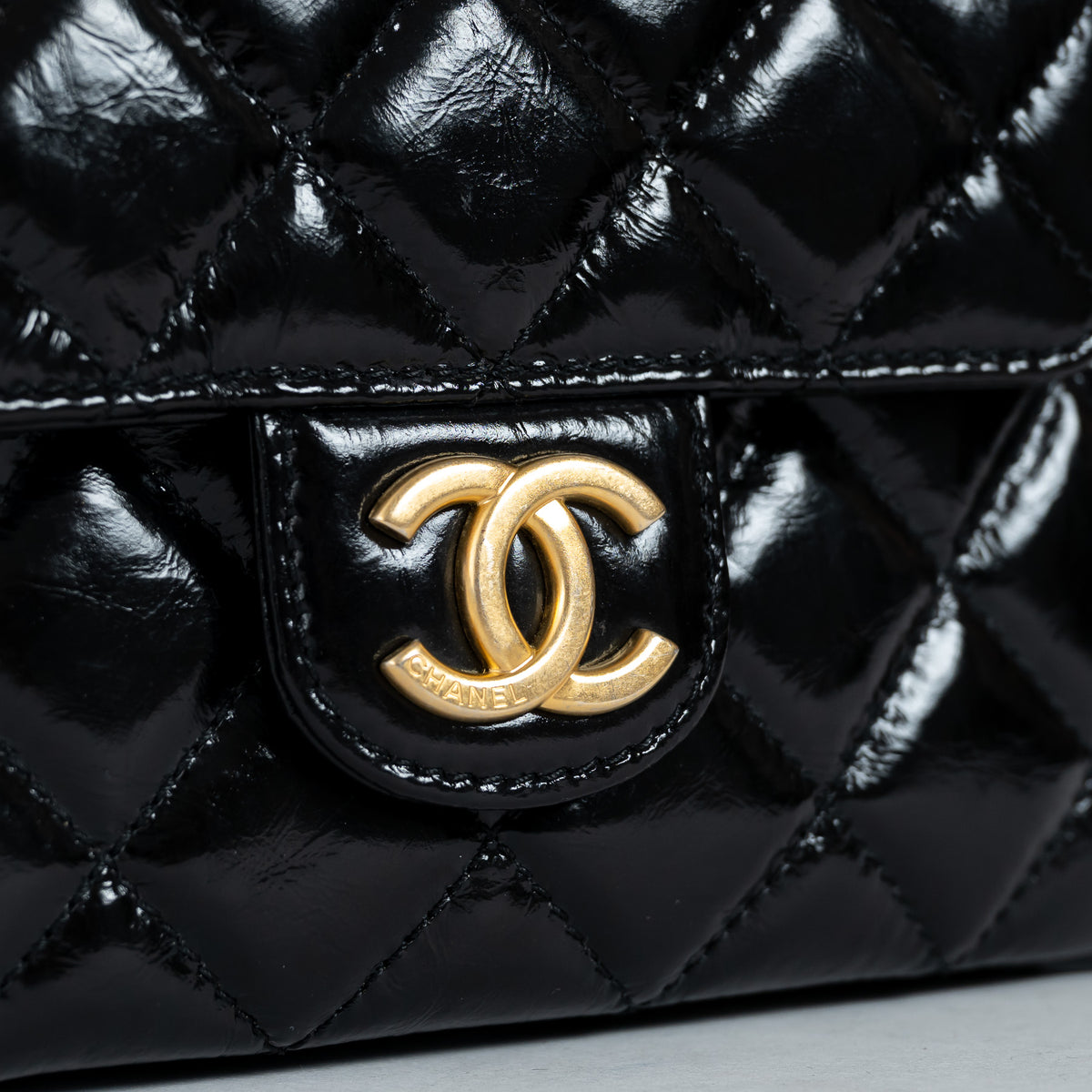 Pre-Loved Chanel™ Black Shiny Aged Calfskin Leather Small Wave Hobo Bag