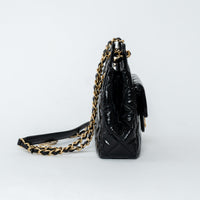 Pre-Loved Chanel™ Black Shiny Aged Calfskin Leather Small Wave Hobo Bag