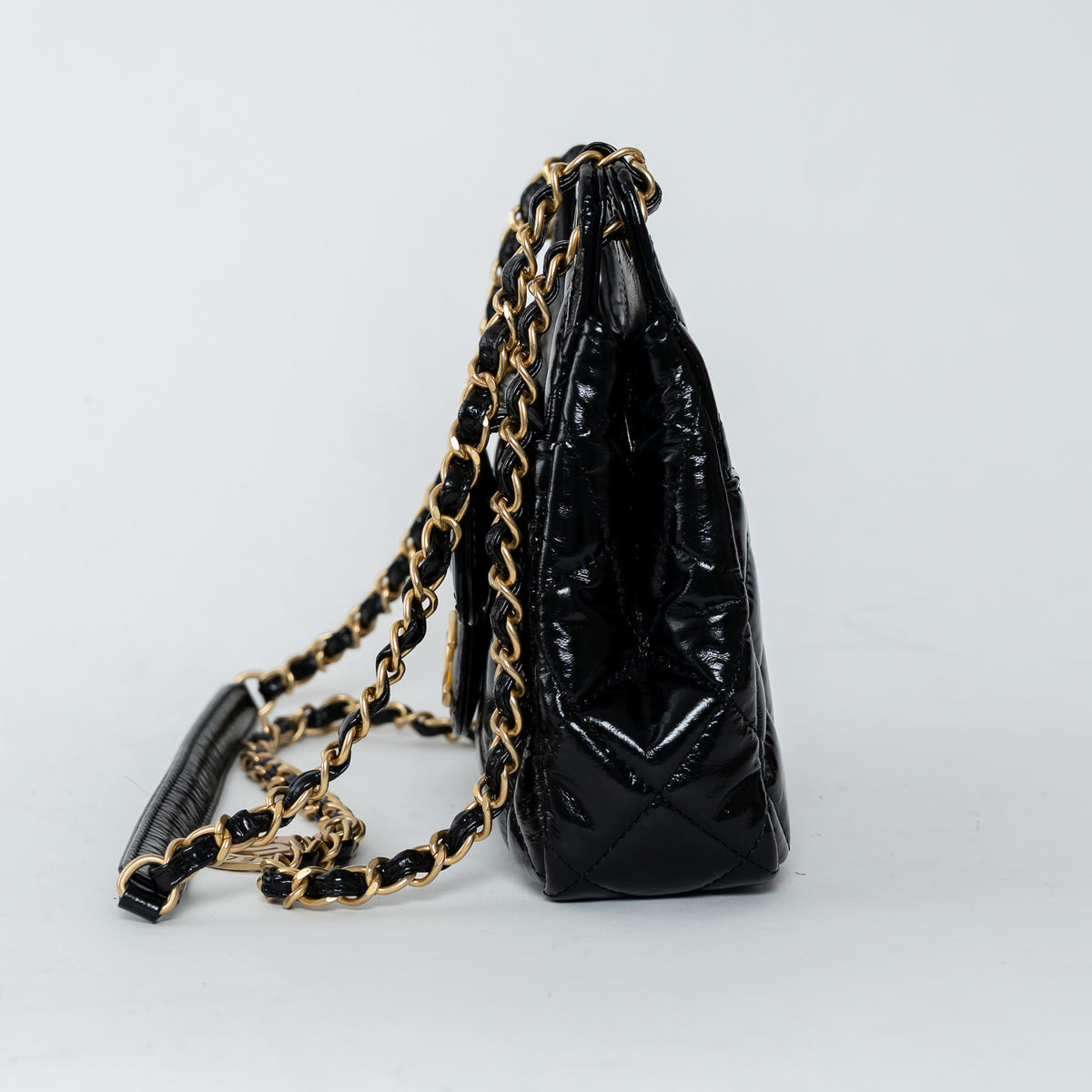 Pre-Loved Chanel™ Black Shiny Aged Calfskin Leather Small Wave Hobo Bag