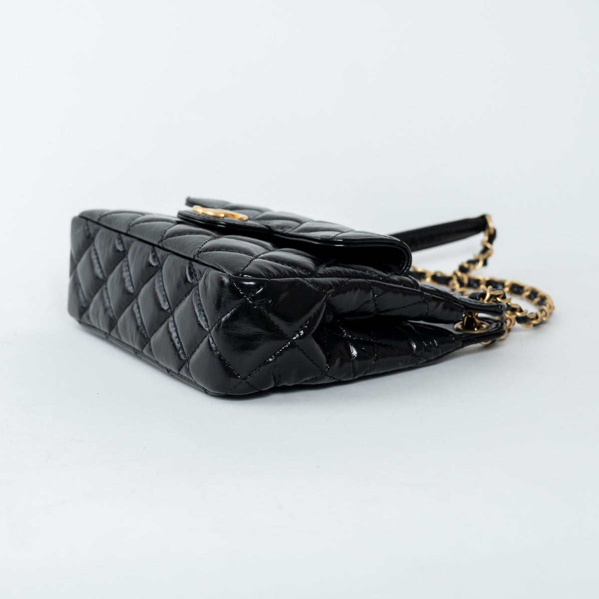 Pre-Loved Chanel™ Black Shiny Aged Calfskin Leather Small Wave Hobo Bag