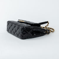 Pre-Loved Chanel™ Black Shiny Aged Calfskin Leather Small Wave Hobo Bag