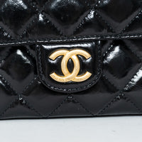 Pre-Loved Chanel™ Black Shiny Aged Calfskin Leather Small Wave Hobo Bag