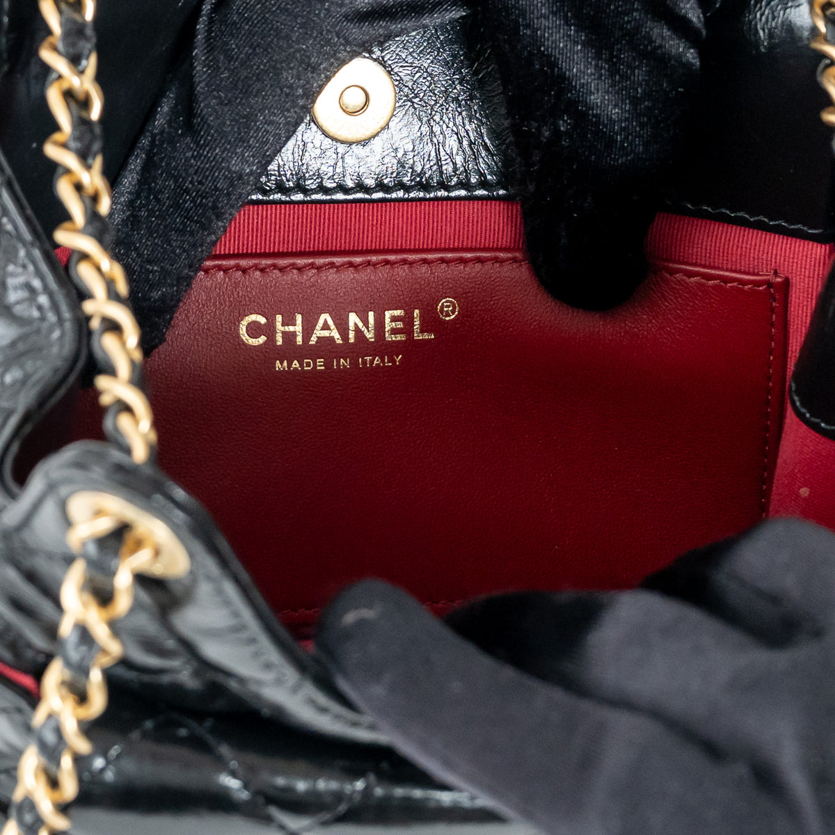 Pre-Loved Chanel™ Black Shiny Aged Calfskin Leather Small Wave Hobo Bag