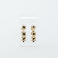 Pre-Loved Chanel™ Light Gold Tone Black Enamel Floral Hoop Earrings