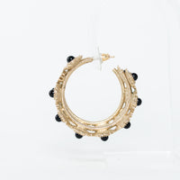 Pre-Loved Chanel™ Light Gold Tone Black Enamel Floral Hoop Earrings