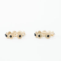 Pre-Loved Chanel™ Light Gold Tone Black Enamel Floral Hoop Earrings