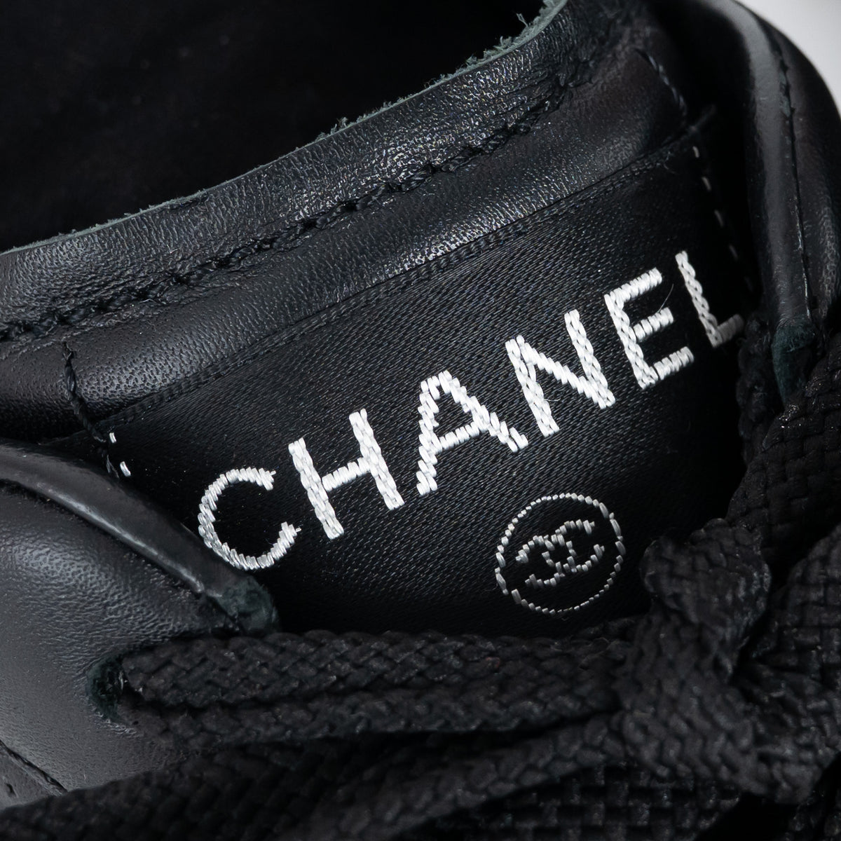 Pre-Loved Chanel™ Black Calfskin Leather Low Top Sneakers Size 35.5