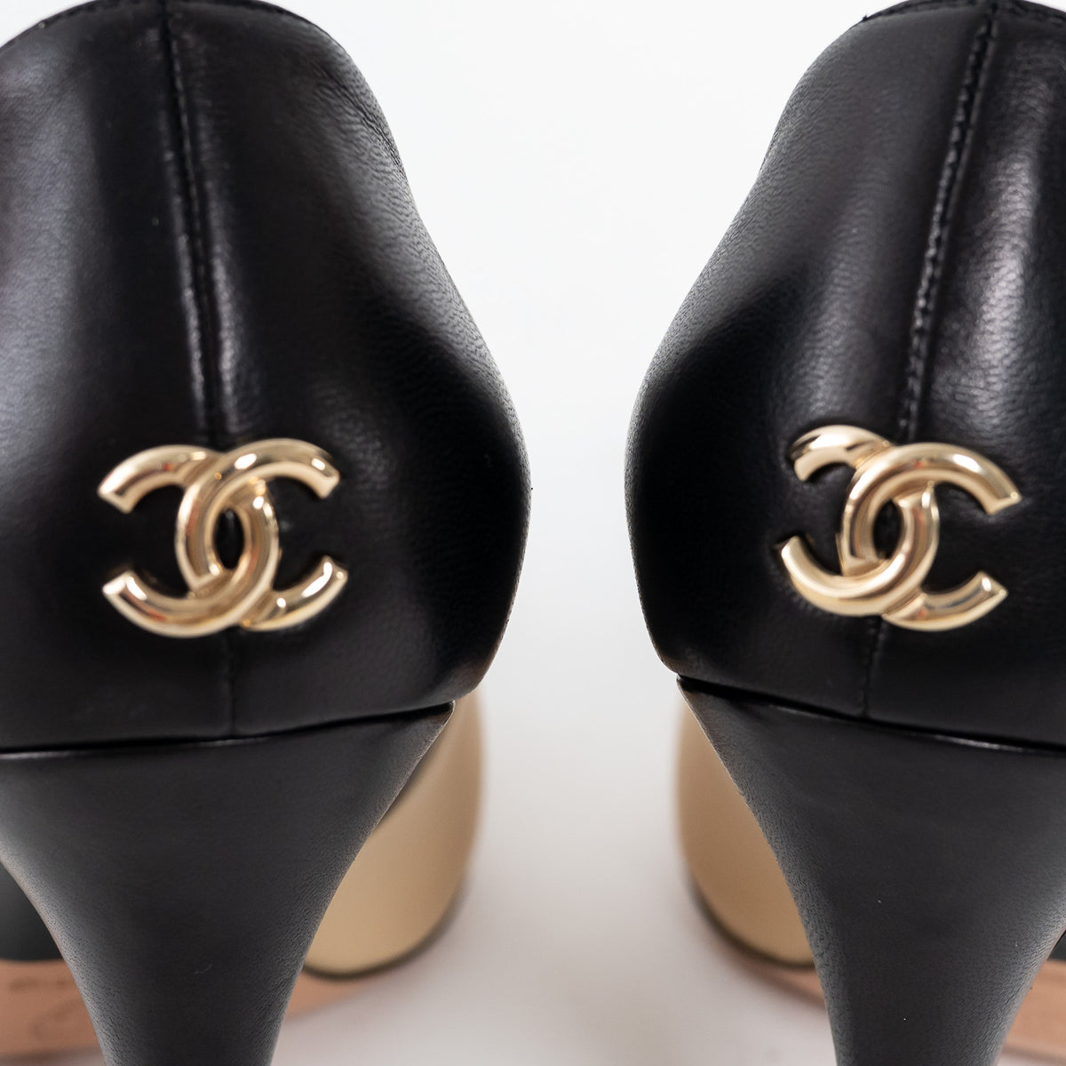 Pre-Loved Chanel™ Two Tone Black Beige Calfskin Leather Pumps Size 38.5