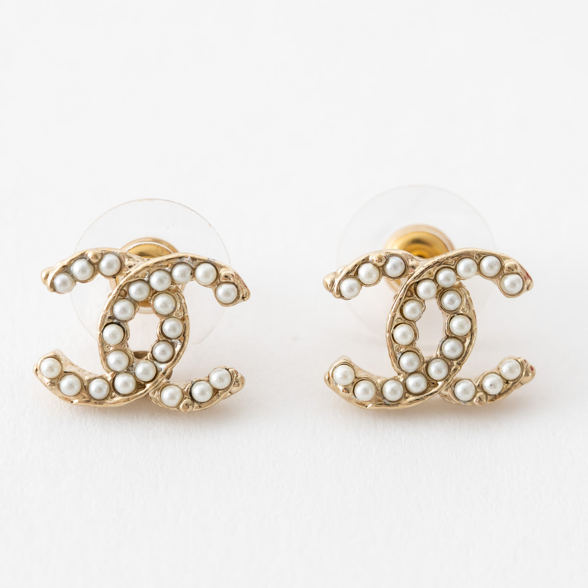 Pre-Loved Chanel™ Gold Tone Faux Pearl Inset Logo Stud Earring