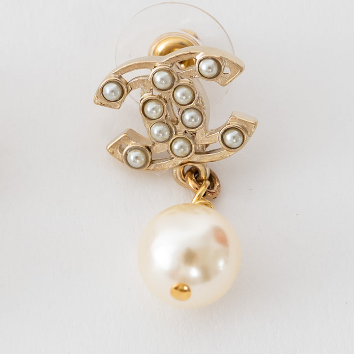 Chanel Gold Tone Cutout Logo Faux Pearl Drop Earrings