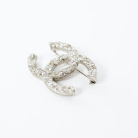 Pre-Loved Chanel™ Silver Tone Crystal Embellished Meteorite Interlocking Letter Brooch