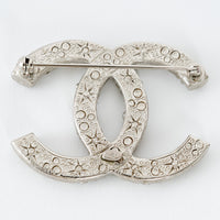 Pre-Loved Chanel™ Silver Tone Crystal Embellished Meteorite Interlocking Letter Brooch