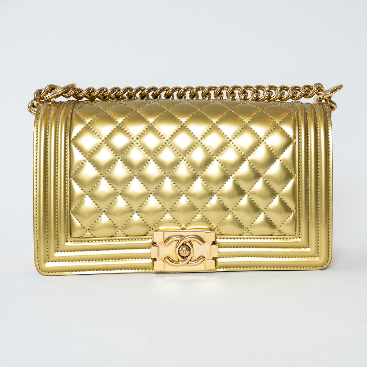 Pre-Loved Chanel™ Gold Patent Leather Medium Boy Bag