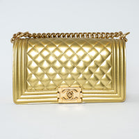 Pre-Loved Chanel™ Gold Patent Leather Medium Boy Bag
