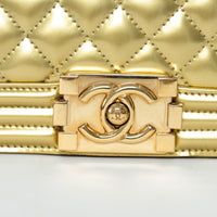 Pre-Loved Chanel™ Gold Patent Leather Medium Boy Bag