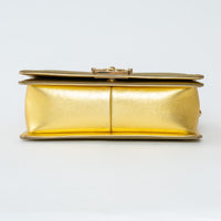 Pre-Loved Chanel™ Gold Patent Leather Medium Boy Bag