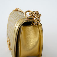 Pre-Loved Chanel™ Gold Patent Leather Medium Boy Bag