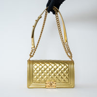 Pre-Loved Chanel™ Gold Patent Leather Medium Boy Bag