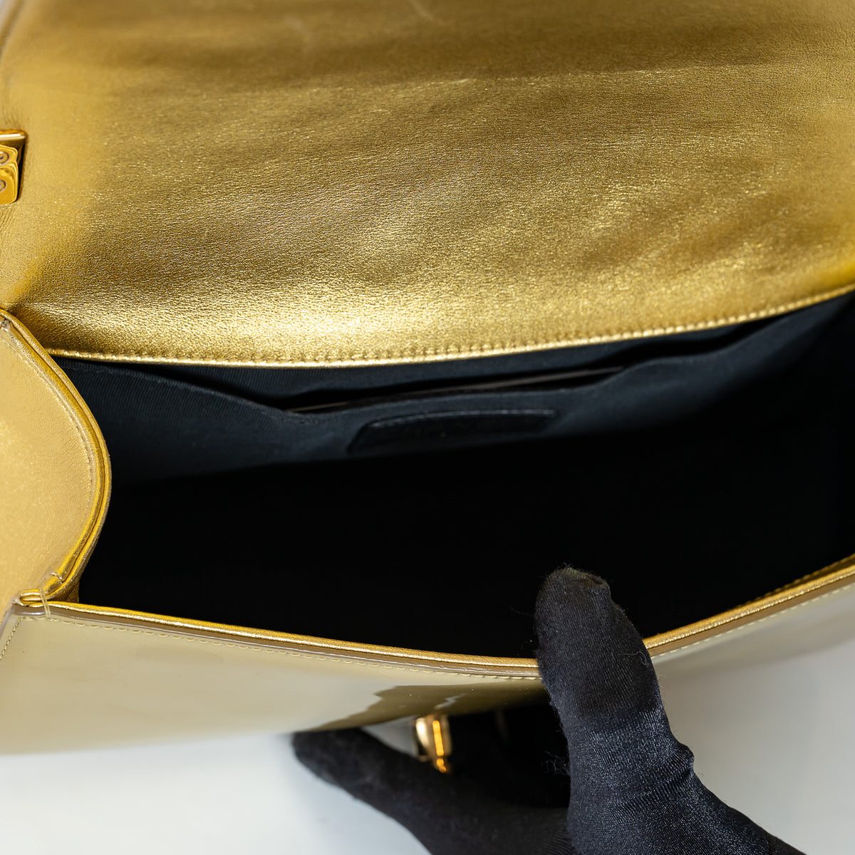 Pre-Loved Chanel™ Gold Patent Leather Medium Boy Bag
