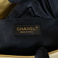 Pre-Loved Chanel™ Gold Patent Leather Medium Boy Bag