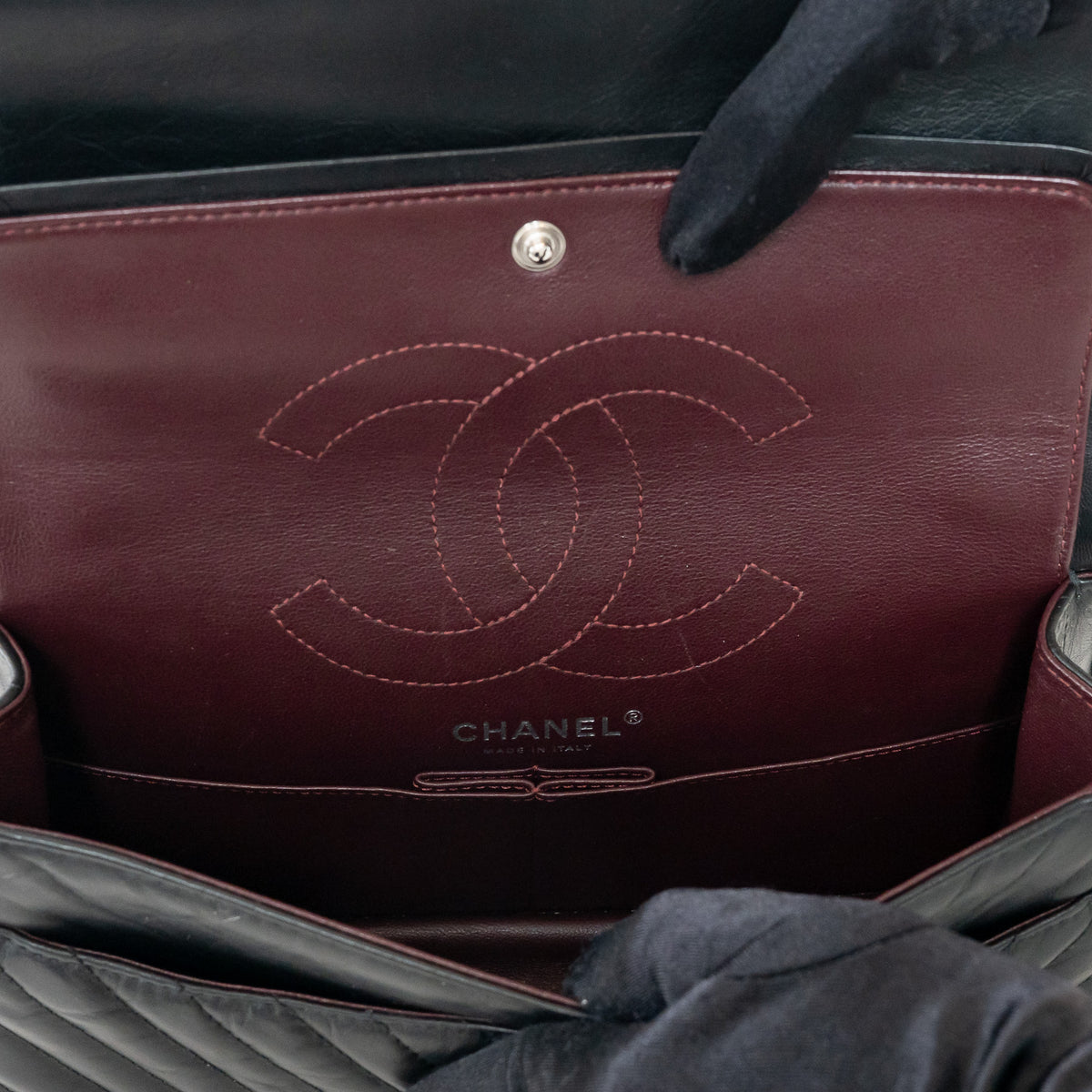 Pre-Loved Chanel™ Black Aged Lambskin Chevron Medium 2.55 Double Flap Bag